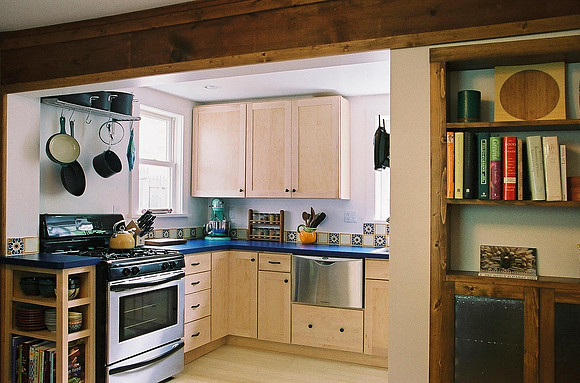 Kitchen to NE through passage wall